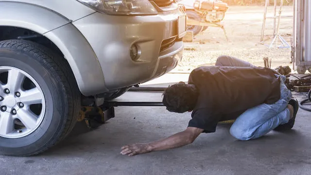 how to change oil without jack stands