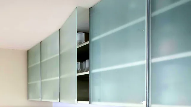 how to hold glass in cabinet door
