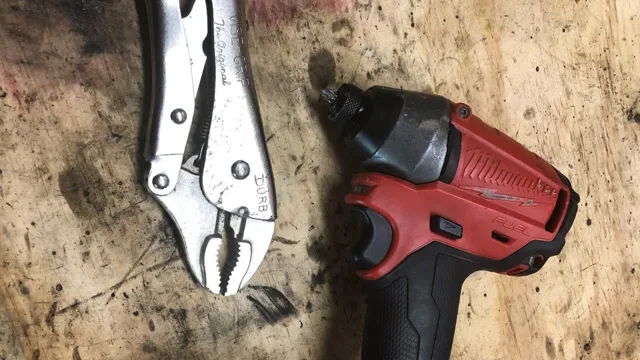 how to remove stuck bit in milwaukee impact driver